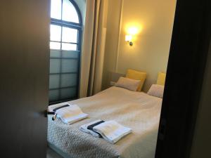 Postel nebo postele na pokoji v ubytování Apartamenty Platinum Loft