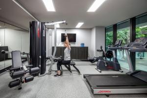 a woman is in a gym on a simulator at Quest NewQuay in Melbourne