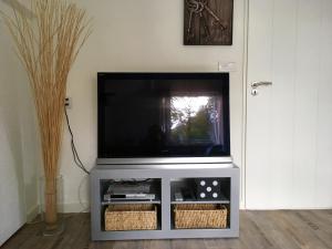 Et tv og/eller underholdning på Apartment Casa Di Mare