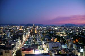 a view of a city at night at Rihga Royal Hotel Hiroshima in Hiroshima