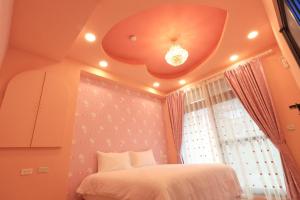 Voodi või voodid majutusasutuse Romantic B&B toas