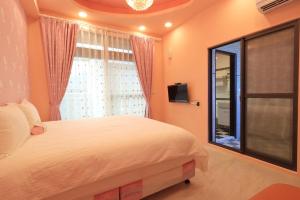 Voodi või voodid majutusasutuse Romantic B&B toas