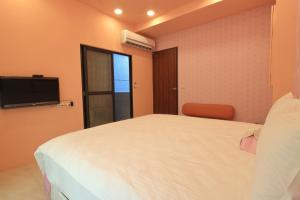 Voodi või voodid majutusasutuse Romantic B&B toas