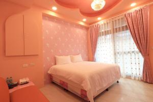 Voodi või voodid majutusasutuse Romantic B&B toas