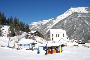 Ferienwohnung Pension Tirol v zimě