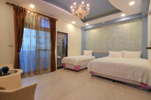 Voodi või voodid majutusasutuse Romantic B&B toas
