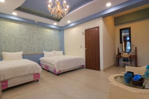 Voodi või voodid majutusasutuse Romantic B&B toas