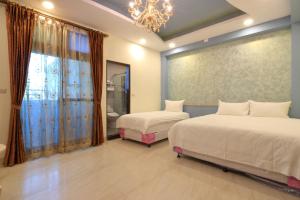 Voodi või voodid majutusasutuse Romantic B&B toas