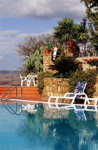 The swimming pool at or close to Villa Dafne