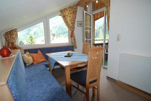 Posezení v ubytování Ferienwohnung Pension Tirol