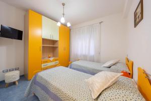 Posteľ alebo postele v izbe v ubytovaní Beauty House