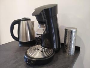 a coffee maker sitting on top of a counter at Maison de ville centre Nogent le Rotrou in Nogent-le-Rotrou