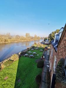 a view of a river from a building at Diglis House Hotel in Worcester