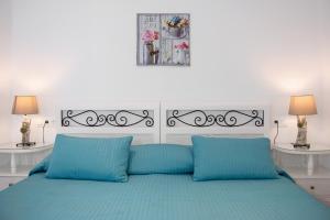 Кровать или кровати в номере Ostria