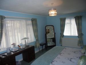 Postel nebo postele na pokoji v ubytování Avondale House