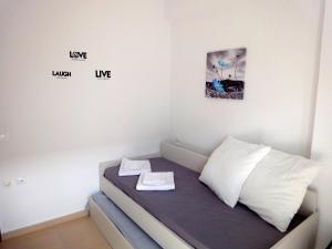 Posteľ alebo postele v izbe v ubytovaní Polychrono Nikos Apartment