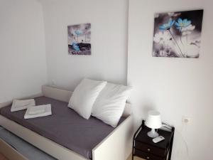 Posteľ alebo postele v izbe v ubytovaní Polychrono Nikos Apartment