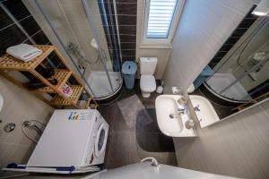 Koupelna v ubytování Palit 497/D, Apartment F + 37 fotografií