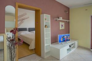 Lova arba lovos apgyvendinimo įstaigoje Apartment Lucy