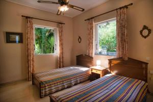 Кровать или кровати в номере CASA DEL MAR