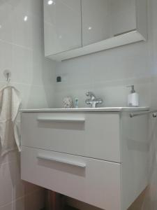 Koupelna v ubytování Pomaranczowa Apartment + 35 fotografií
