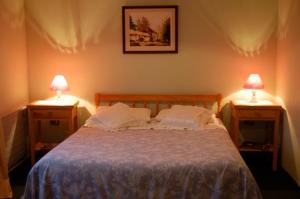 Rúm í herbergi á Hotel Mi Casa