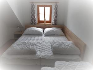 Postel nebo postele na pokoji v ubytování Apartmány Prima Nova Lake