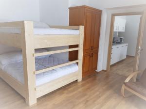 Postel nebo postele na pokoji v ubytování Apartmány Prima Nova Lake
