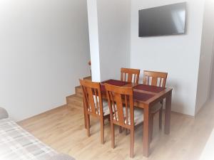 TV a/nebo společenská místnost v ubytování Apartmány Prima Nova Lake