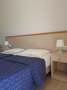 A bed or beds in a room at Sophie Studios Még 10 kép