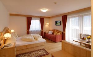 Postel nebo postele na pokoji v ubytování Hotel Talblick