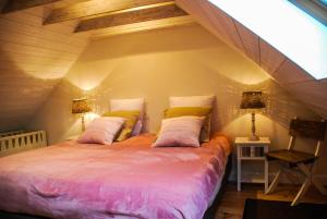 Llit o llits en una habitació de Maison Marie