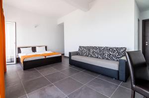 Postel nebo postele na pokoji v ubytování Hotel Cosmos
