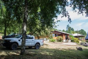 Zahrada ubytování Refugio Ruka Cümelen + 14 fotografií
