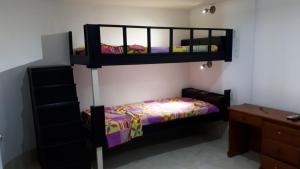 Poschodová posteľ alebo postele v izbe v ubytovaní Finca Bella Vista