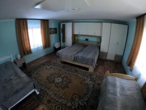 A bed or beds in a room at Apartma Lipa