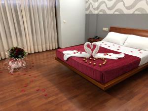 Postel nebo postele na pokoji v ubytování Motel Abalo