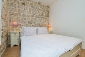 Krevet ili kreveti u jedinici u objektu Historical Old town apartments
