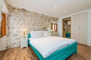Krevet ili kreveti u jedinici u objektu Historical Old town apartments