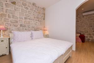 Krevet ili kreveti u jedinici u objektu Historical Old town apartments