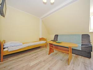Łóżko lub łóżka w pokoju w obiekcie Mieszkanko na poddaszu