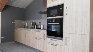 Kuchyň nebo kuchyňský kout v ubytování Gîte du Domaine Saint Jean De L'arbousier