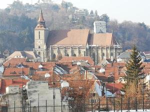 a view of a city with a clock tower at Casa Schei in Braşov +37 photos