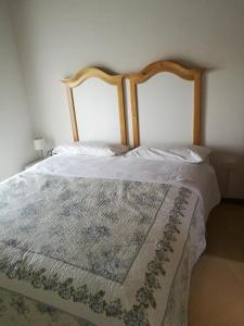 Een bed of bedden in een kamer bij B&B L'Upupa