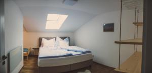 Posteľ alebo postele v izbe v ubytovaní Apartment NinetyFour