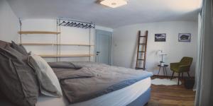 Posteľ alebo postele v izbe v ubytovaní Apartment NinetyFour