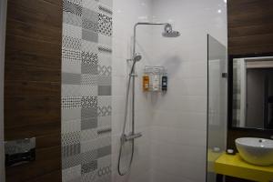 a bathroom with a shower and a sink at Guest House Amaya in Plovdiv +35 photos