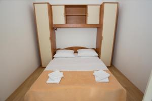 Postel nebo postele na pokoji v ubytování Beach Studio Apartment Marija