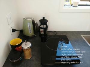 a coffee maker sitting on a counter in a kitchen at Ridge View in Wanaka