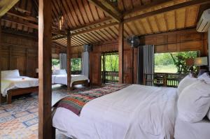 Postel nebo postele na pokoji v ubytování Bali Lush